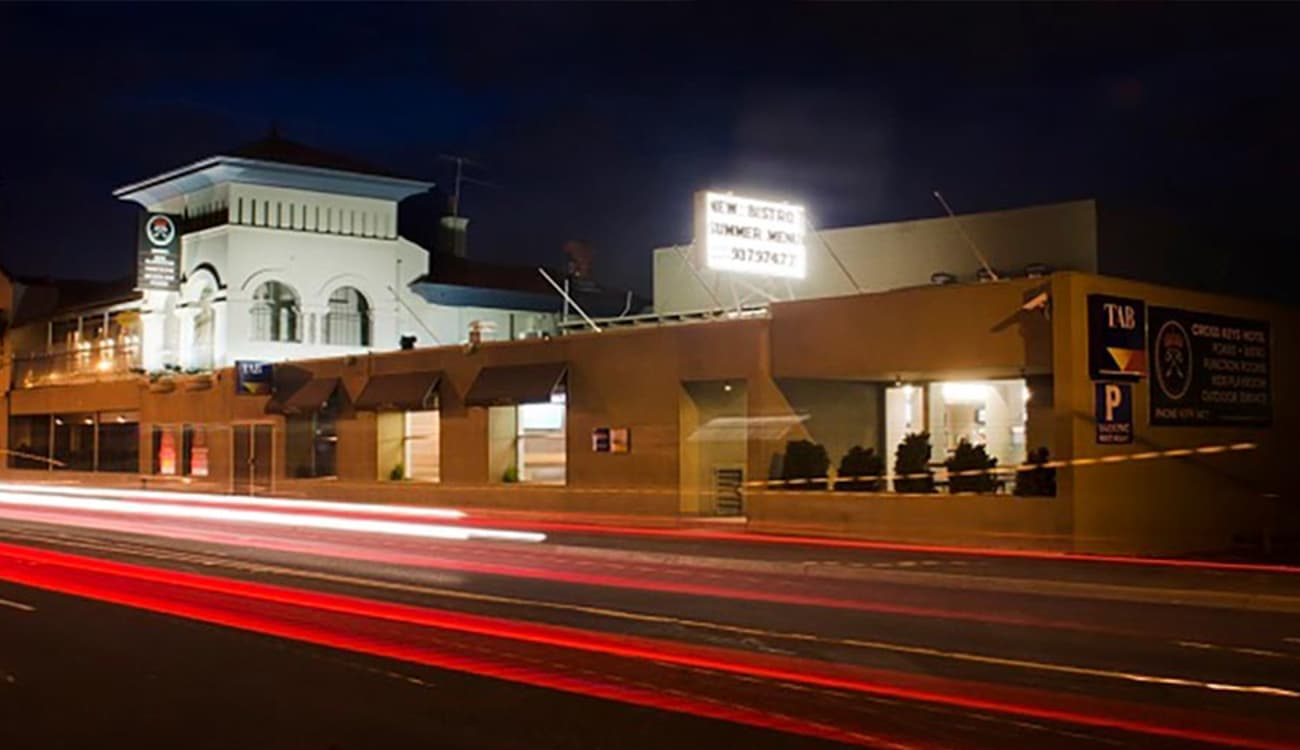 The exterior at night of the Cross Keys Hotel in the heart of Essendon.